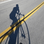 Cyclist in the Shadows